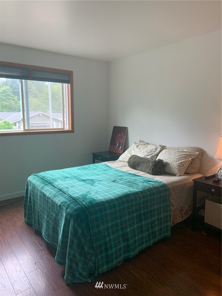 3302 198th Place Southeast Bothell, WA 98012 - Photo 12 of 19 a bedroom with a bed and window