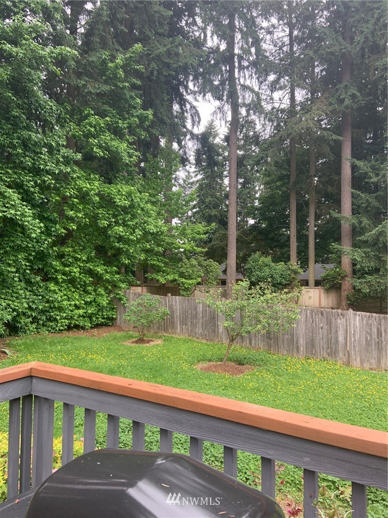 3302 198th Place Southeast Bothell, WA 98012 - Photo 18 of 19 a view of a wooden deck with a yard