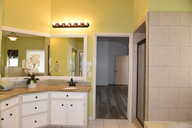 a bathroom with a bathtub and a toilet
