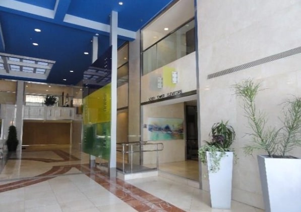 800 Brazos Street, Unit 1006 Austin, TX 78701 - Photo 18 of 26 a lobby with a door and potted plant
