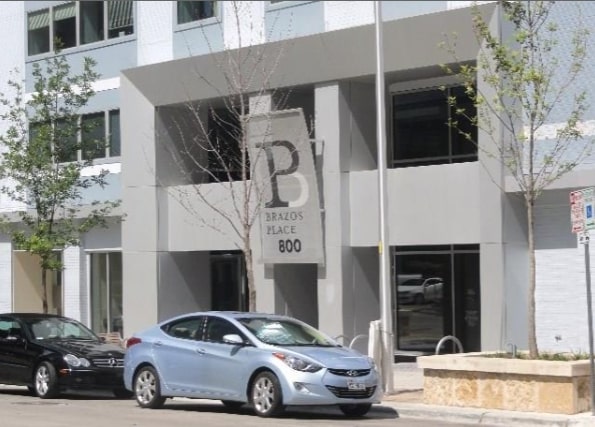 800 Brazos Street, Unit 1006 Austin, TX 78701 - Photo 19 of 26 a car parked in front of a building