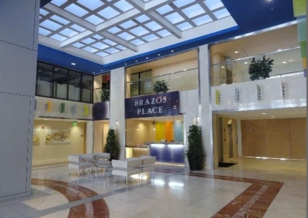 800 Brazos Street, Unit 1006 Austin, TX 78701 - Photo 20 of 26 a lobby with furniture and a floor to ceiling window