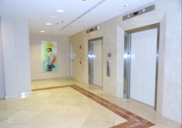 800 Brazos Street, Unit 1006 Austin, TX 78701 - Photo 22 of 26 a view of hallway with shower