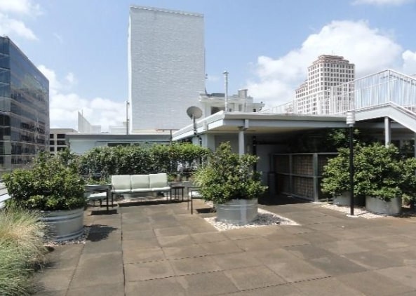 800 Brazos Street, Unit 1006 Austin, TX 78701 - Photo 25 of 26 a view of a patio with couches and potted plants
