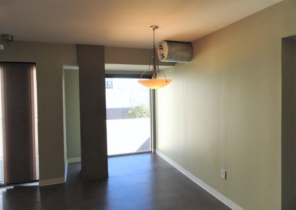 800 Brazos Street, Unit 1006 Austin, TX 78701 - Photo 7 of 26 a view of hallway with wooden floor