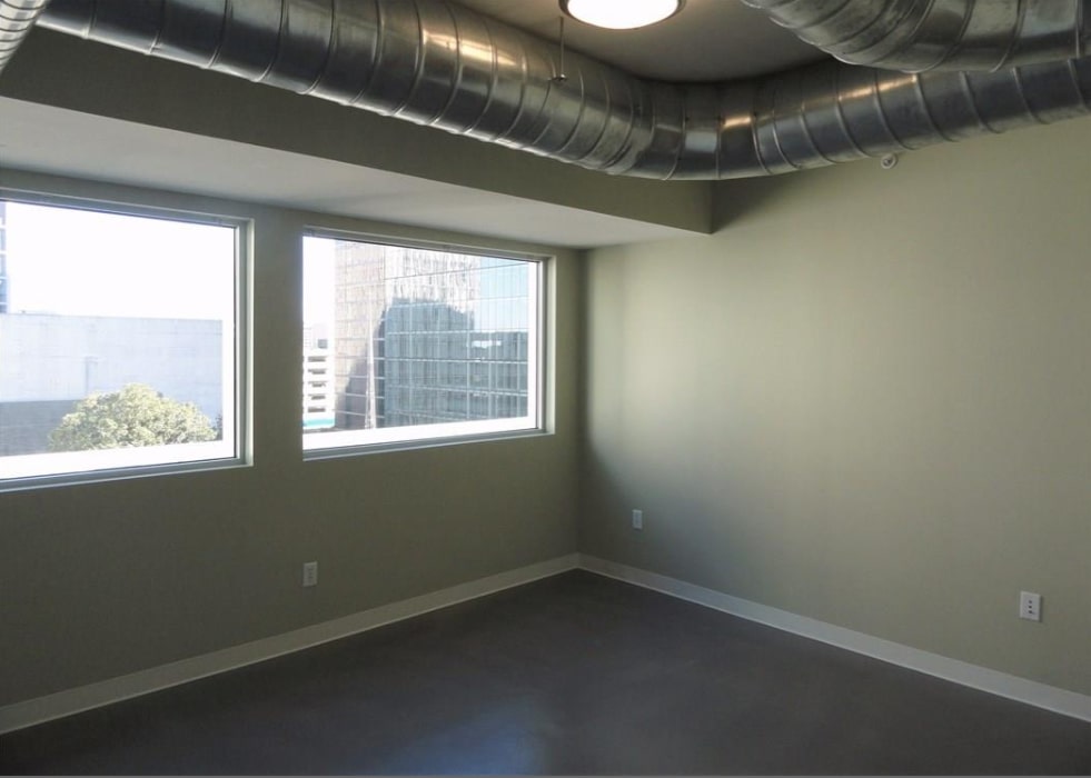800 Brazos Street, Unit 1006 Austin, TX 78701 - Photo 8 of 26 an empty room with a window