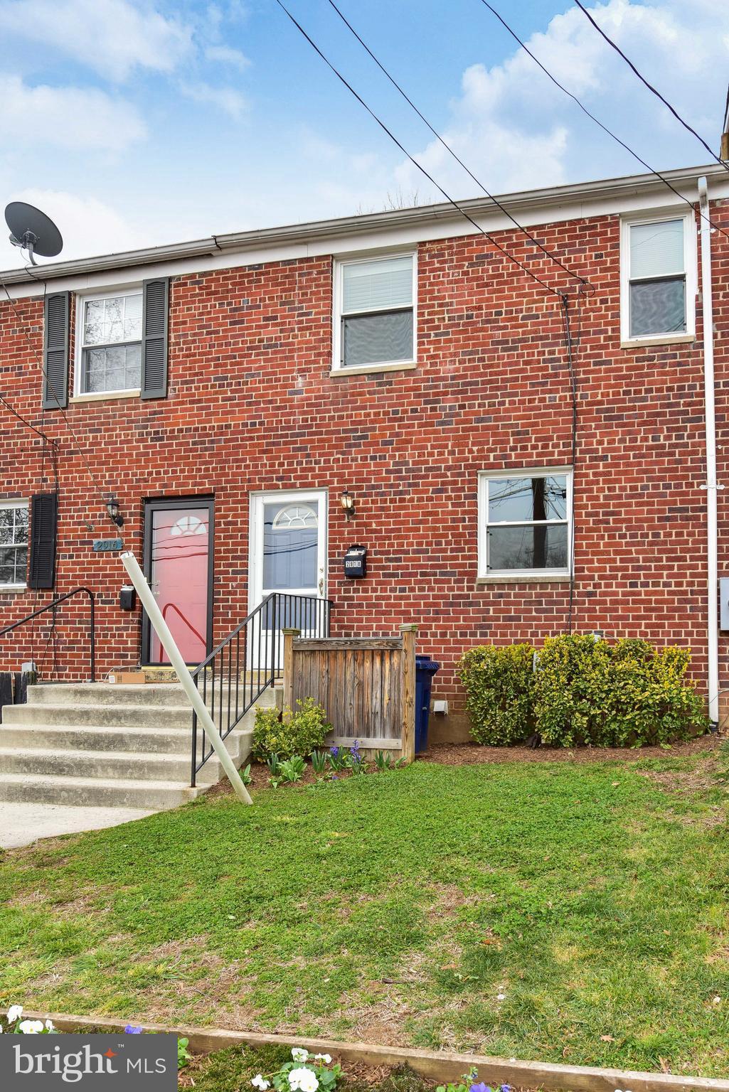 2918 Hickory Street Alexandria, VA 22305 - Photo 1 of 30 a front view of a house with garden