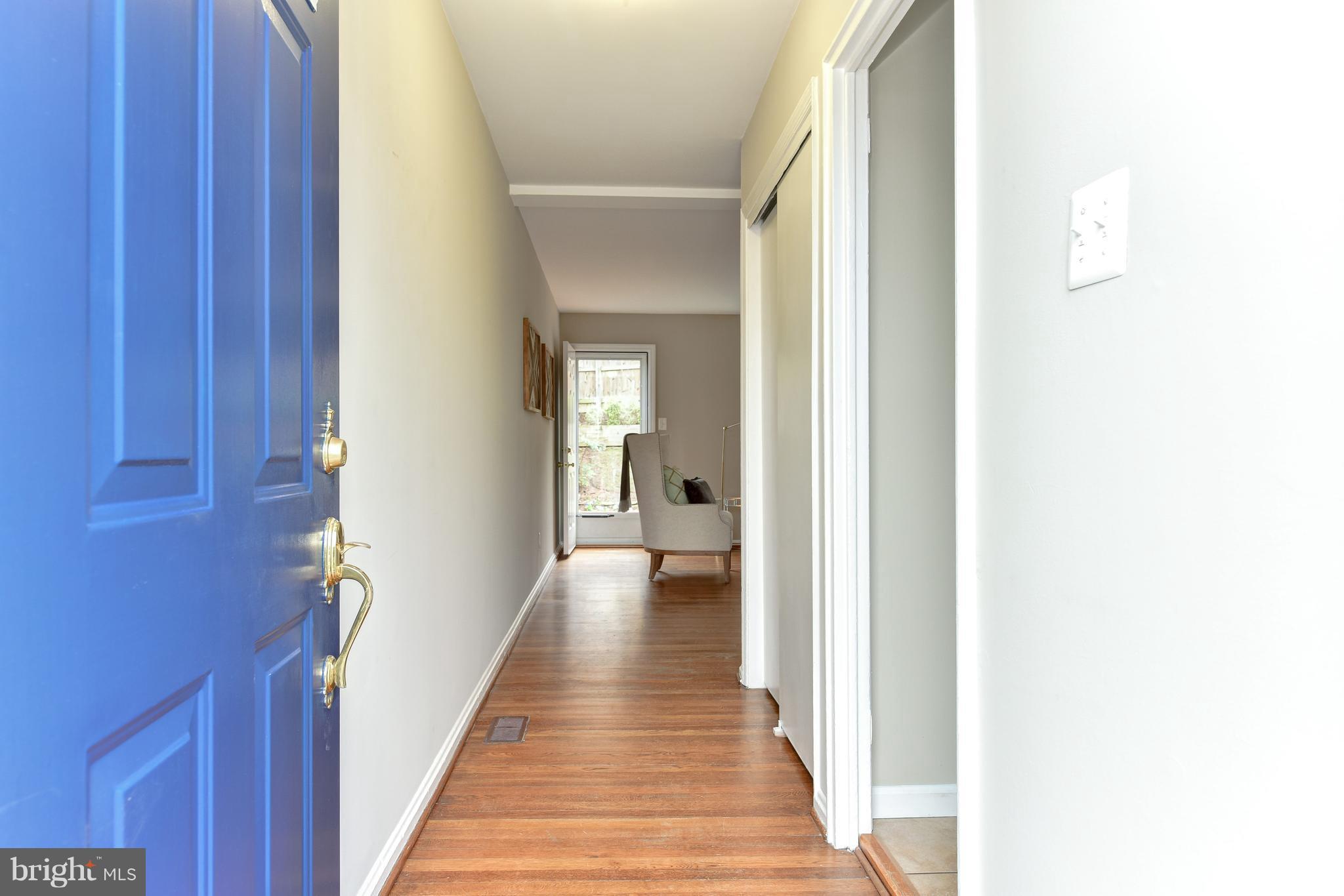 2918 Hickory Street Alexandria, VA 22305 - Photo 2 of 30 a view of a hallway with wooden floor