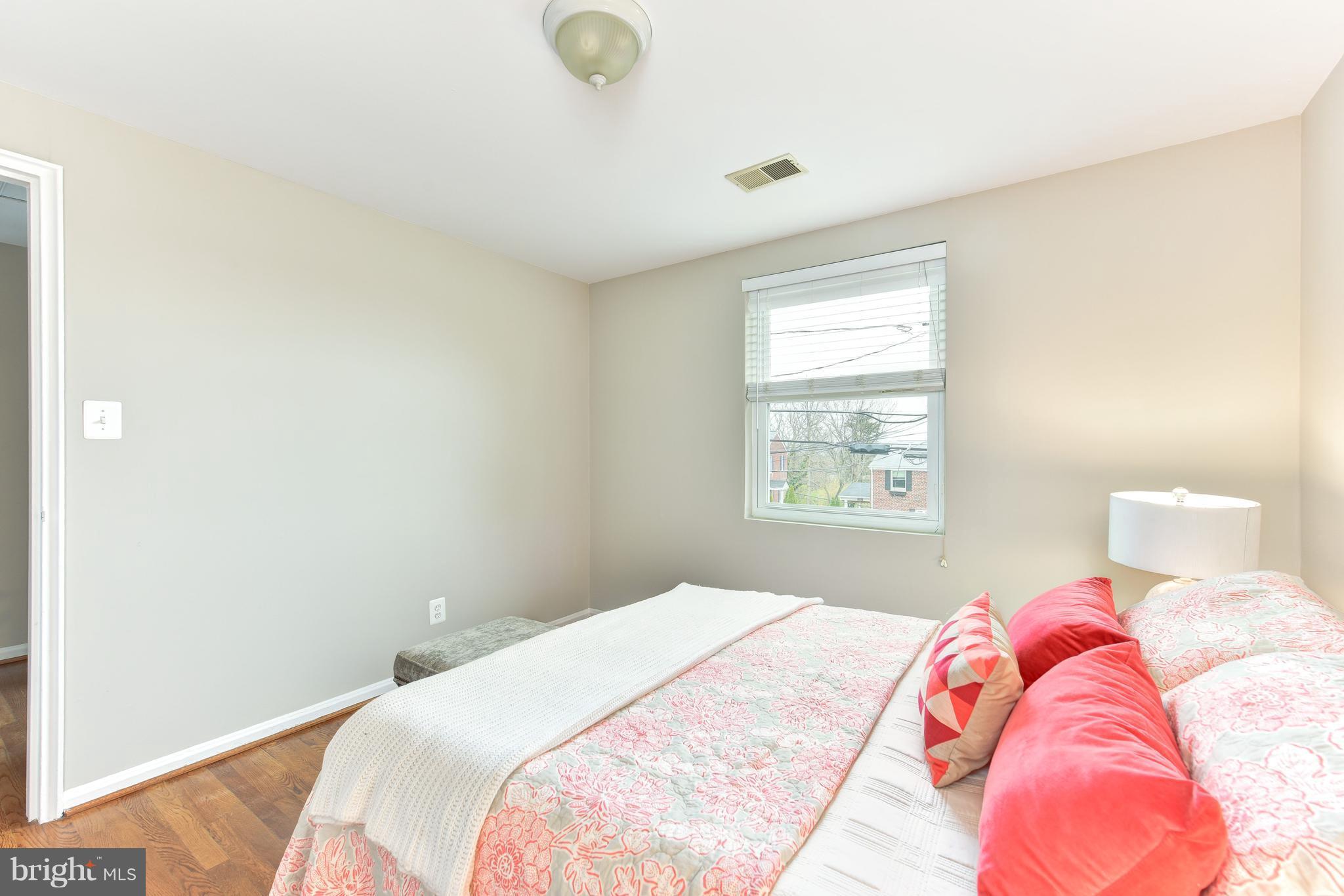 2918 Hickory Street Alexandria, VA 22305 - Photo 21 of 30 a bedroom with a bed and a window