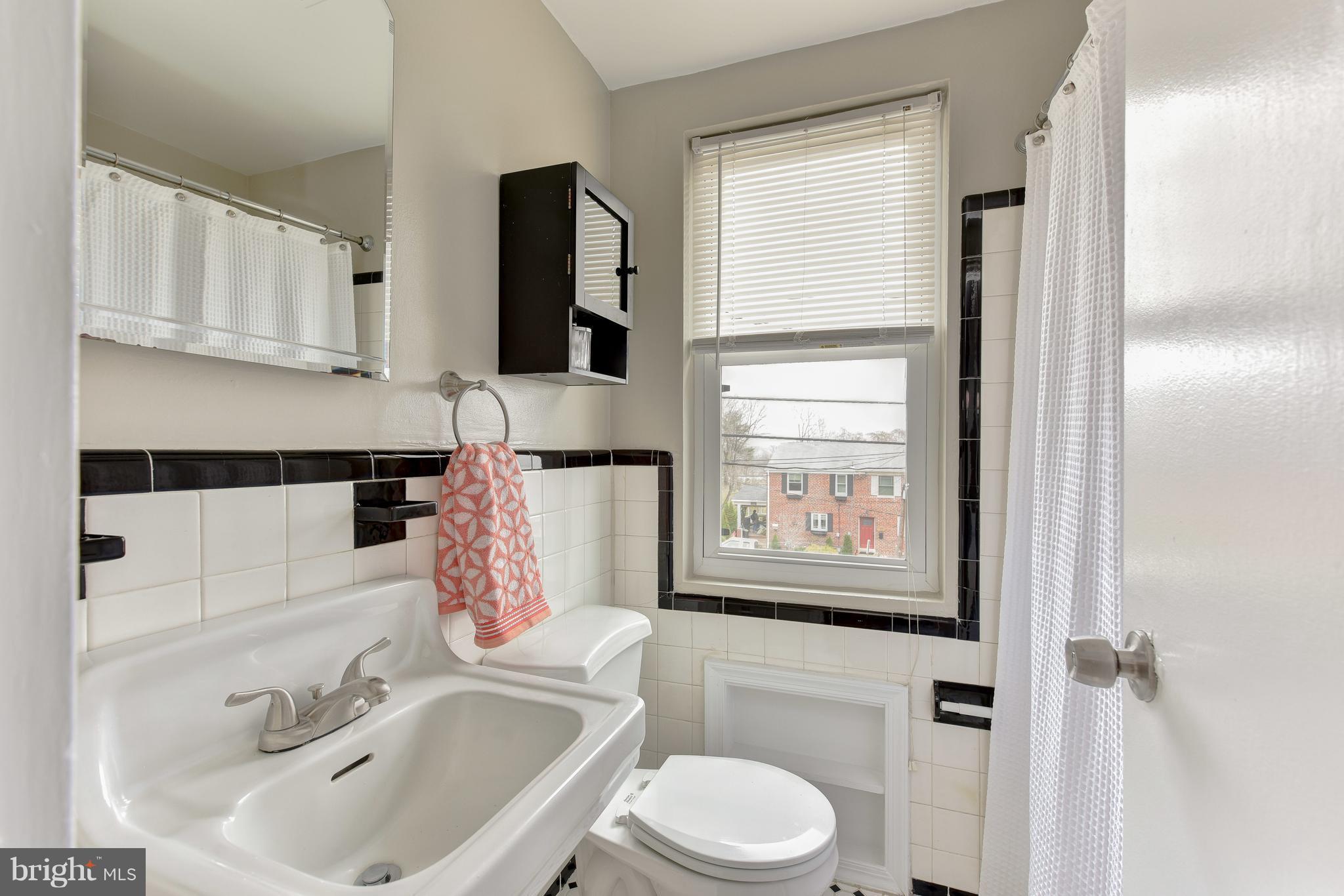 2918 Hickory Street Alexandria, VA 22305 - Photo 23 of 30 a bathroom with a sink toilet and shower