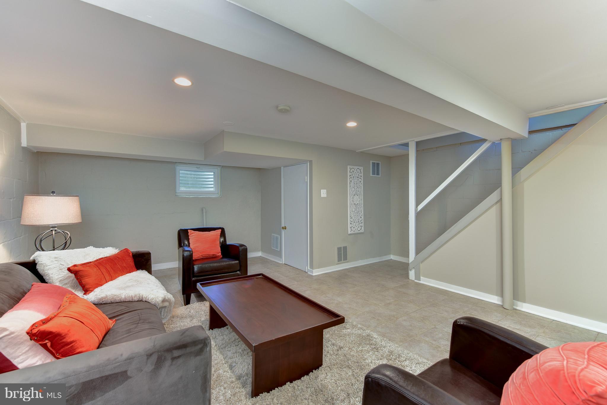 2918 Hickory Street Alexandria, VA 22305 - Photo 25 of 30 a living room with furniture and a couch