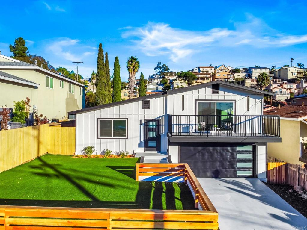 a view of swimming pool with a yard and seating area