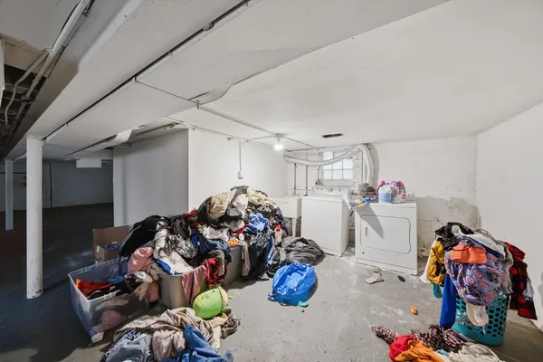 a room with furniture and a chandelier