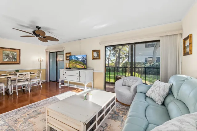 a living room with furniture and a couch