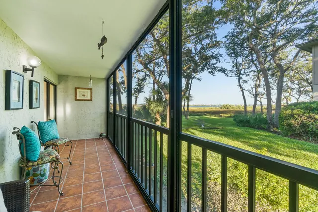 a view of a porch with furniture