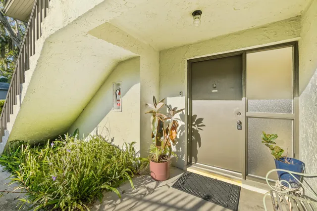 a room with a bed and a dresser