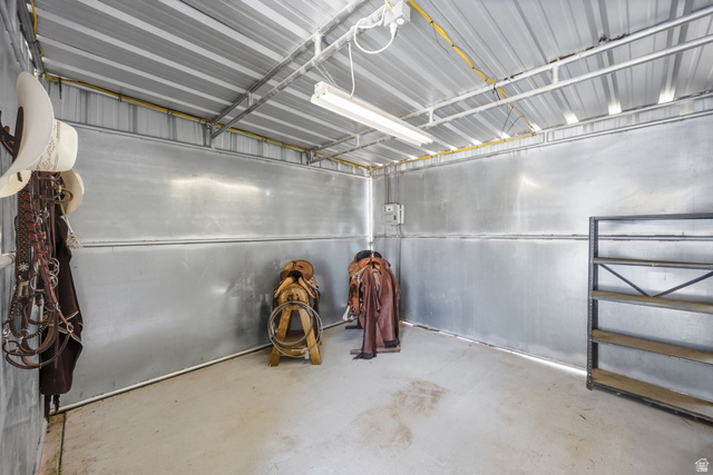 3732 Campbell Road Tooele, UT 84074 - Photo 6 of 69 Enclosed structure featuring corrugated metal walls and ceiling