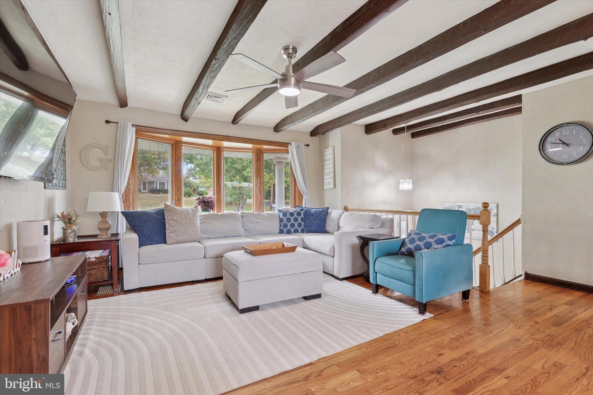 217 Hoffecker Road Phoenixville, PA 19460 - Photo 3 of 25 a living room with furniture and a large window