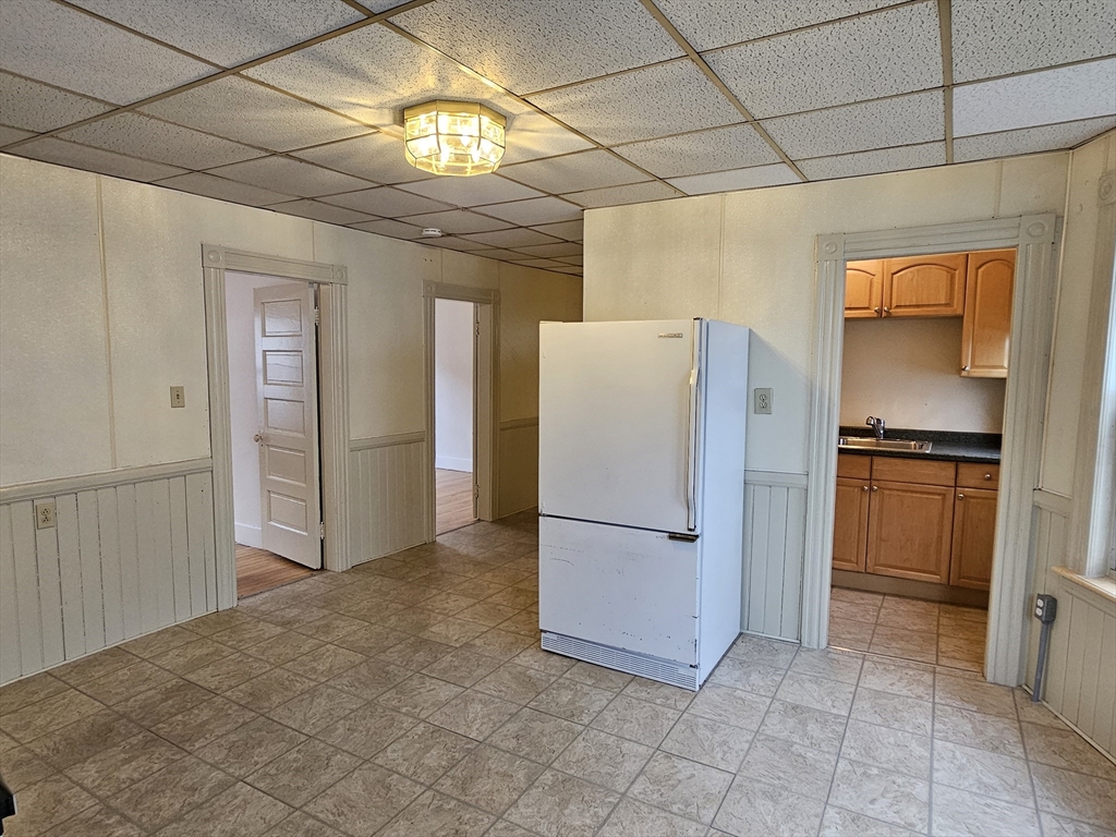 20 Kosta Street, Unit 1 Worcester, MA 01607 - Photo 7 of 17 a view of empty room with kitchen