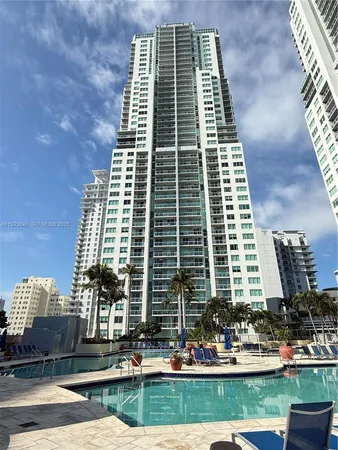 a front view of a building with outdoor space
