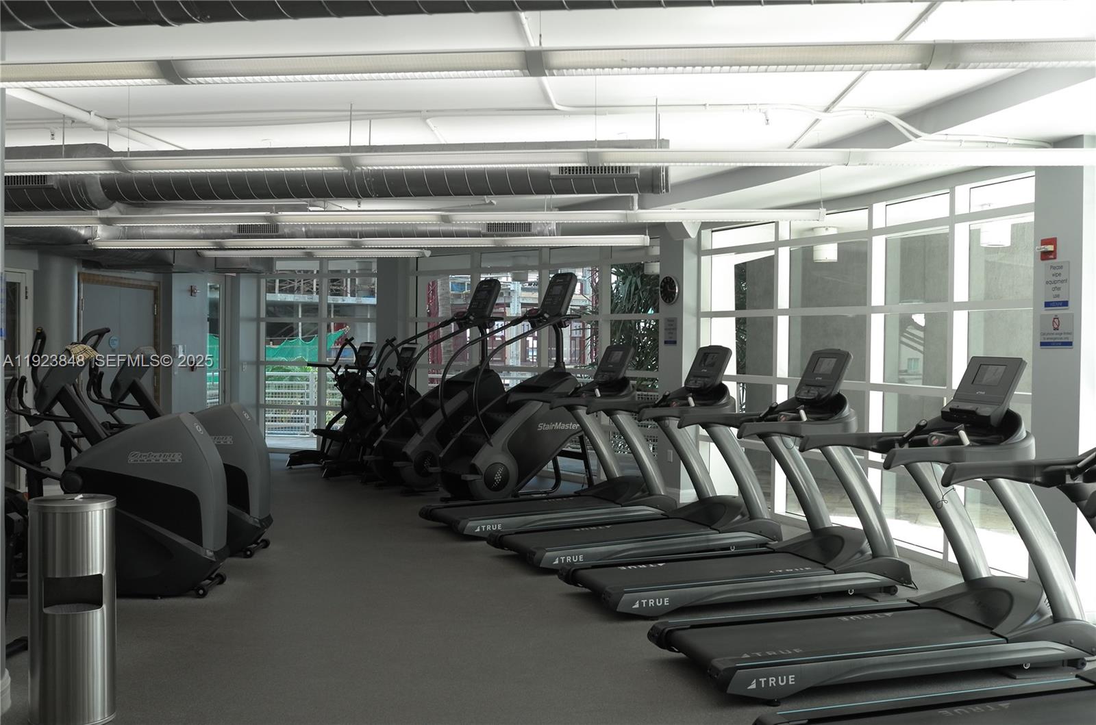 253 Northeast 2nd Street, Unit 908 Miami, FL 33132 - Photo 22 of 47 a view of a room with gym equipment