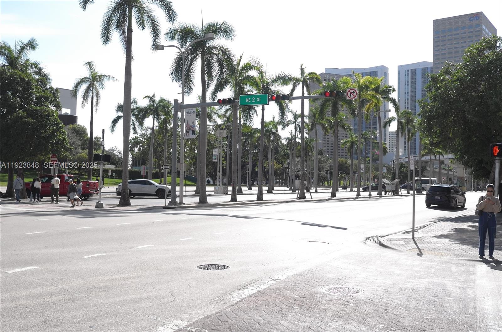 253 Northeast 2nd Street, Unit 908 Miami, FL 33132 - Photo 9 of 47 a view of a street with a cars parked