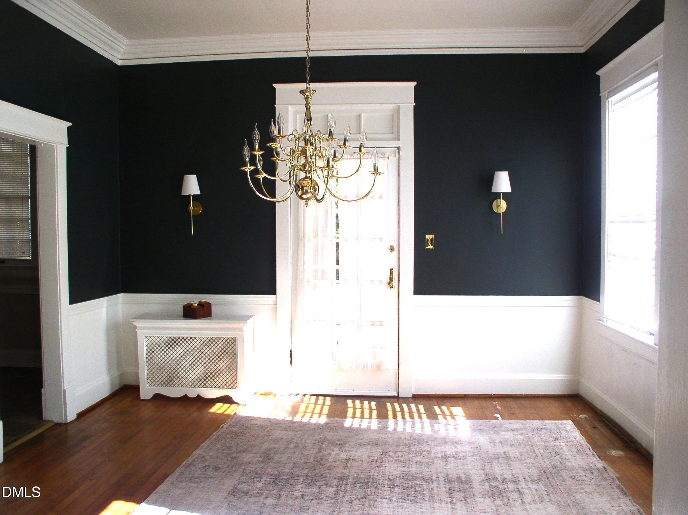 934 South Chestnut Street Henderson, NC 27536 - Photo 11 of 56 a view of a living room with a window