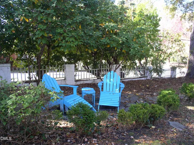 a view of a backyard with garden