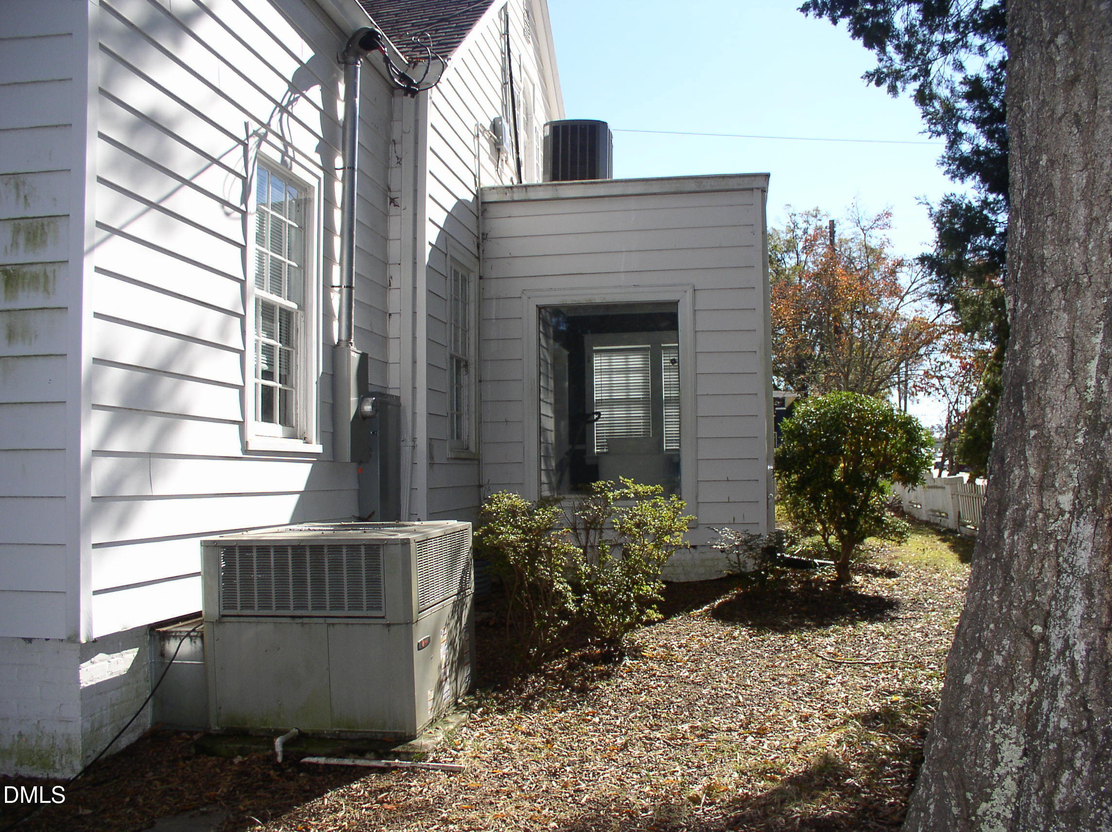 934 South Chestnut Street Henderson, NC 27536 - Photo 50 of 56 a view of a house with a yard and potted plants