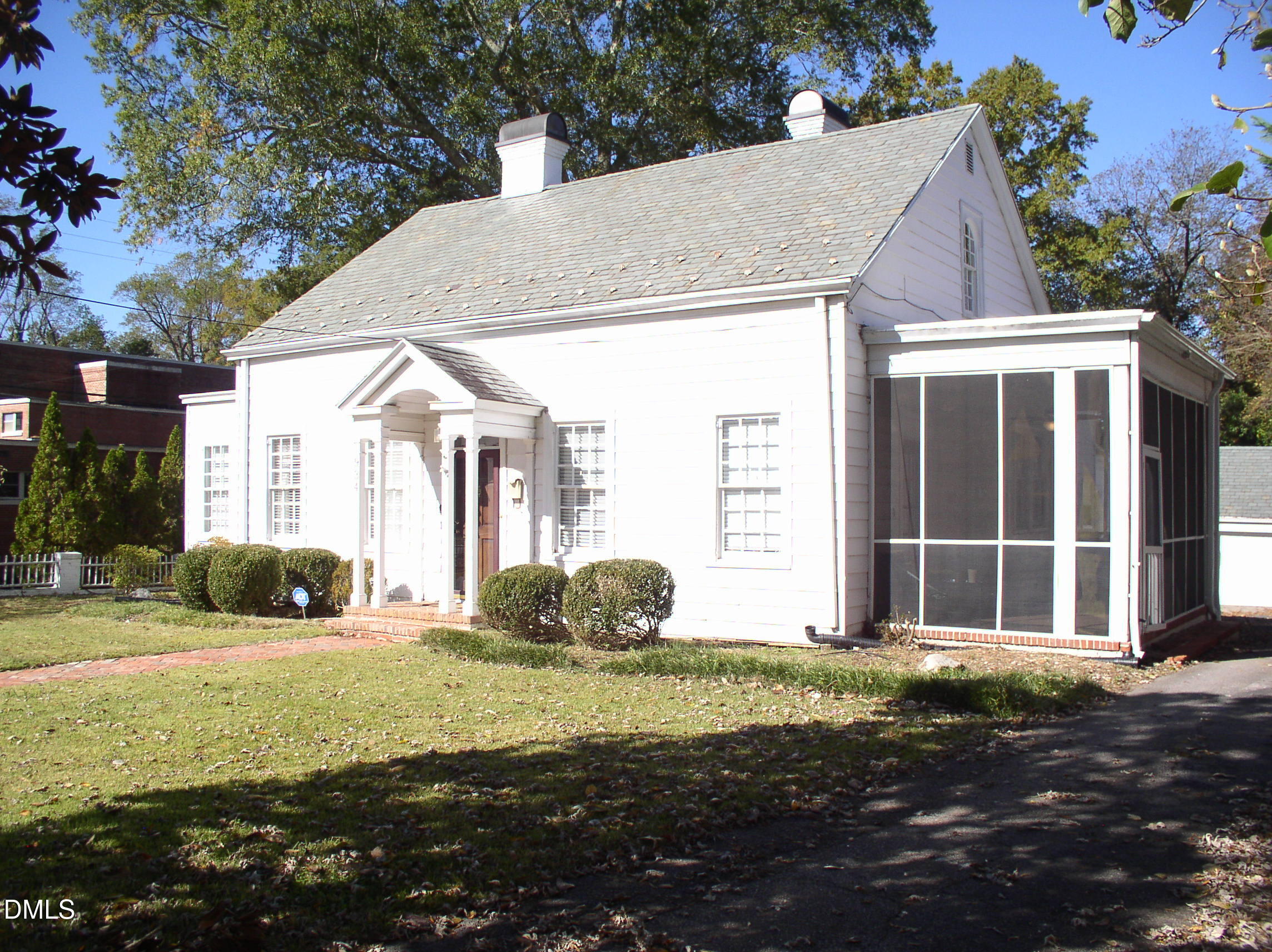 934 South Chestnut Street Henderson, NC 27536 - Photo 56 of 56 a house with yard in front of it