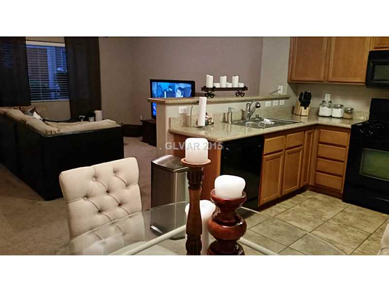 7701 West Robindale Road, Unit 145 Las Vegas, NV 89113 - Photo 11 of 34 Other. Kitchen/living room/bkfst bar