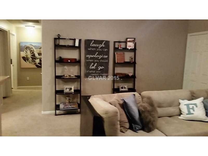 7701 West Robindale Road, Unit 145 Las Vegas, NV 89113 - Photo 12 of 34 Living Room.