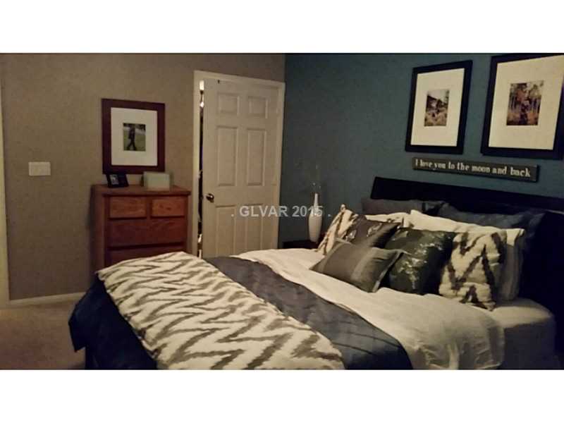 7701 West Robindale Road, Unit 145 Las Vegas, NV 89113 - Photo 14 of 34 Master Bedroom.