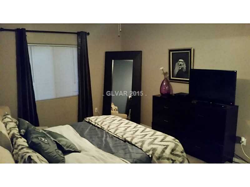 7701 West Robindale Road, Unit 145 Las Vegas, NV 89113 - Photo 15 of 34 Master Bedroom.