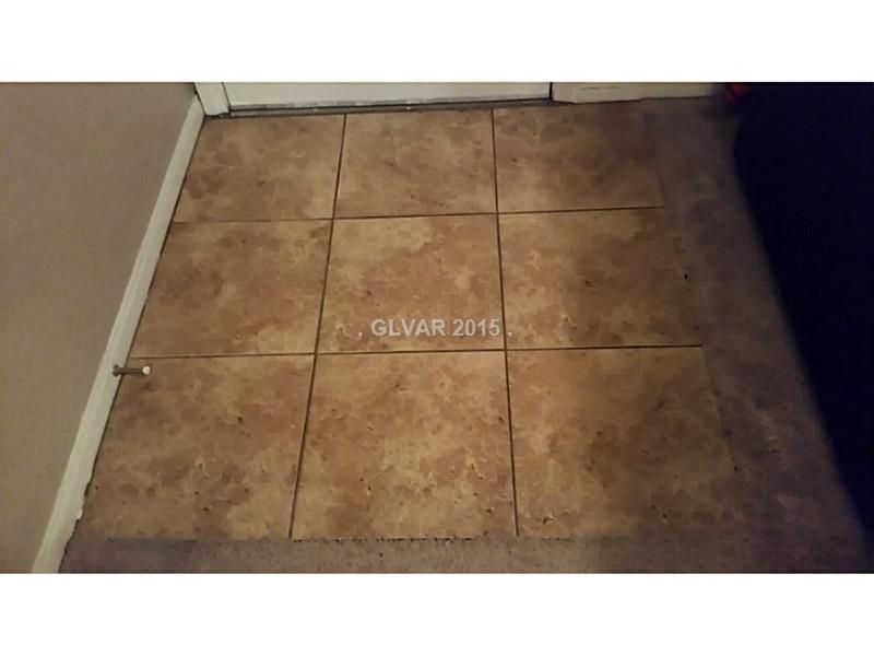 7701 West Robindale Road, Unit 145 Las Vegas, NV 89113 - Photo 23 of 34 Entry Hall. Ceramic tile in entry