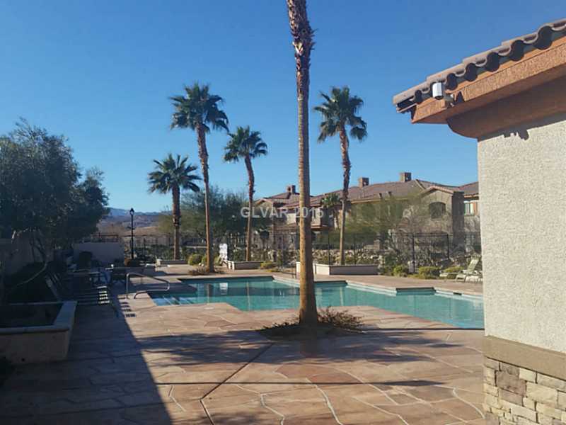 7701 West Robindale Road, Unit 145 Las Vegas, NV 89113 - Photo 29 of 34 Community Pool. Community pool and spa, privately gated
