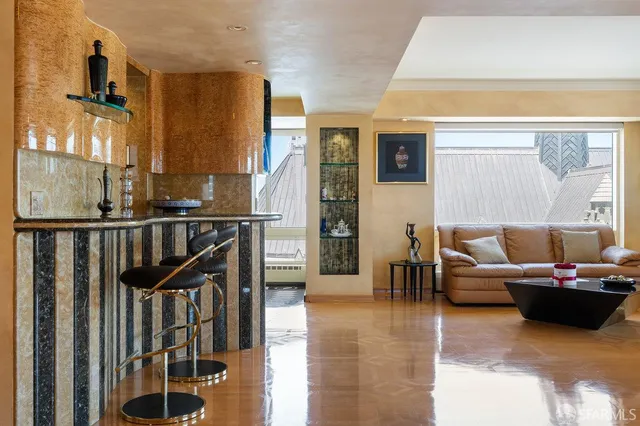 a view of a living room with a wooden floor