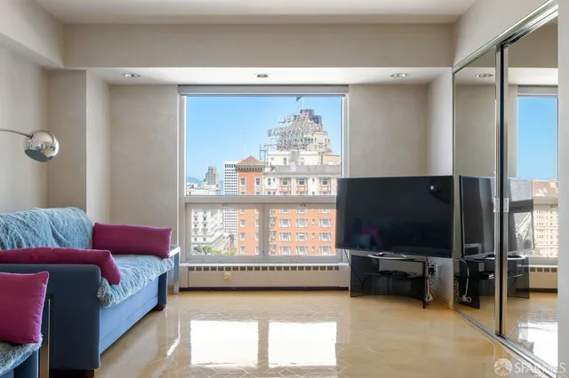 a view of a building with sitting area