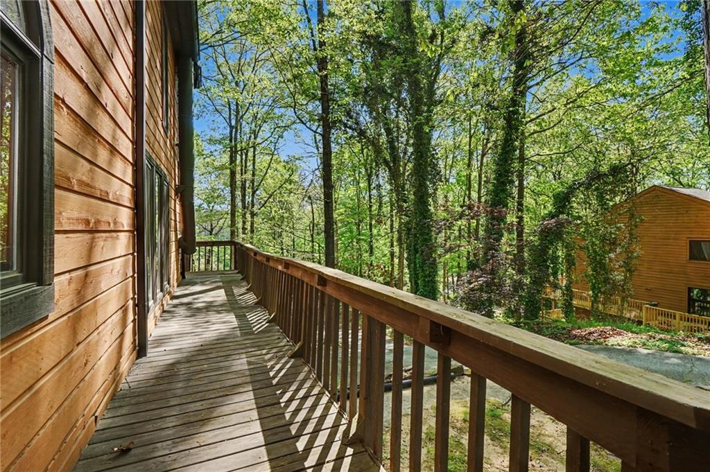 2530 Rockbridge Road Northwest Conyers, GA 30012 - Photo 39 of 45 a view of balcony with wooden floor and fence