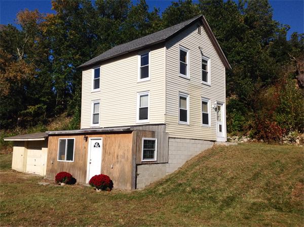 36 Bethany Road Monson, MA 01057 - Photo 3 of 14 a view of a house with a yard