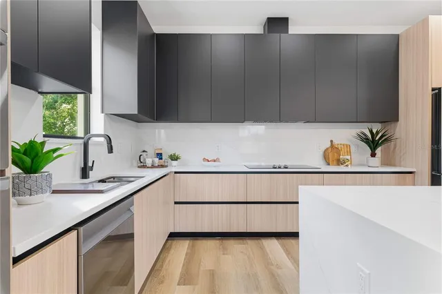 a view of a kitchen and dining room