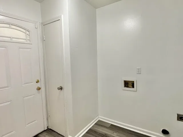 a house with trees in the background