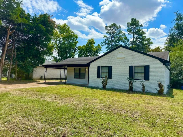 a front view of house with yard