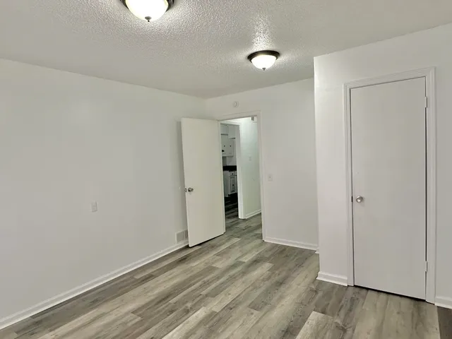 a bathroom with a sink toilet and mirror