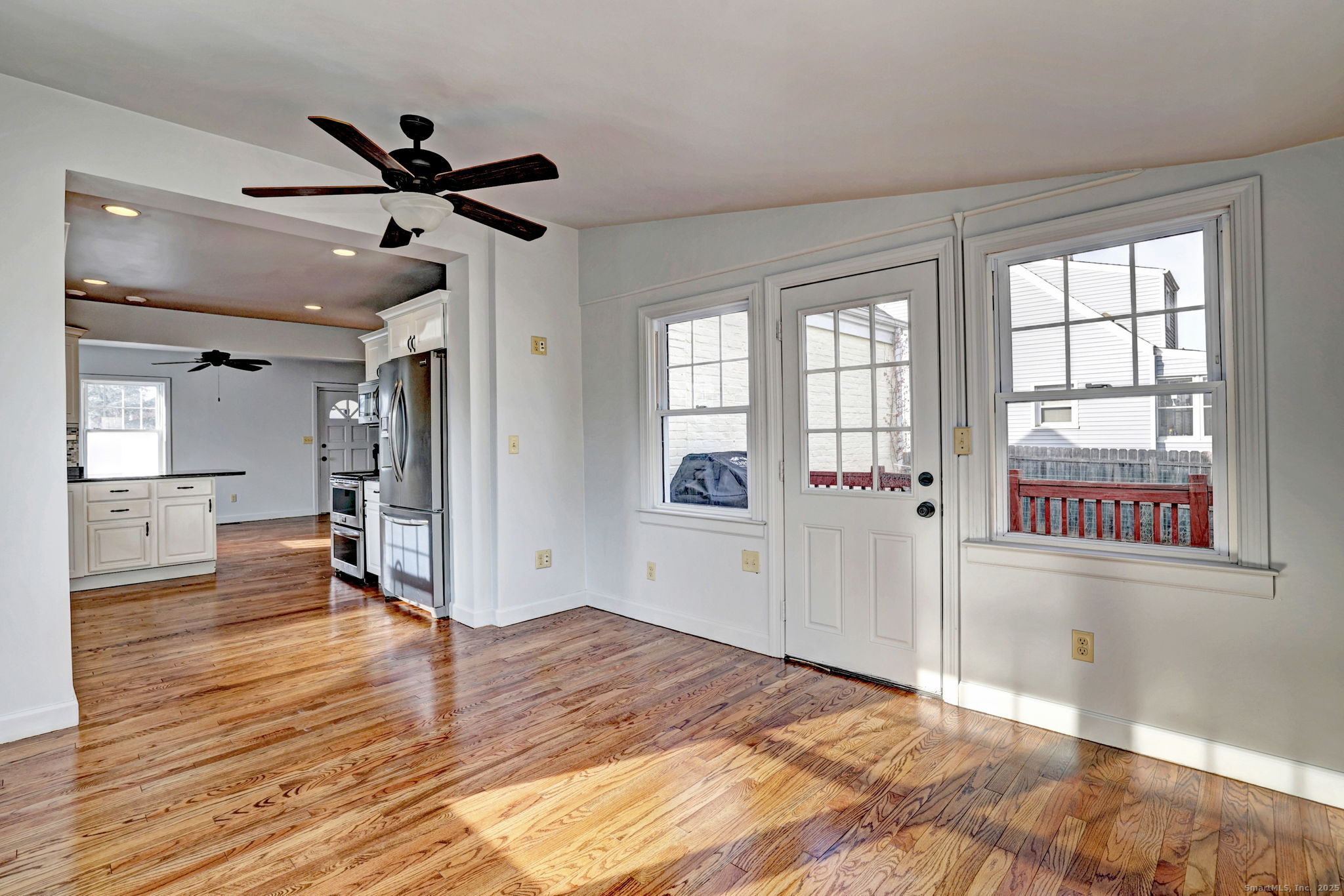 113 Chester Street Hamden, CT 06514 - Photo 20 of 40 a view of a room with wooden floor and window