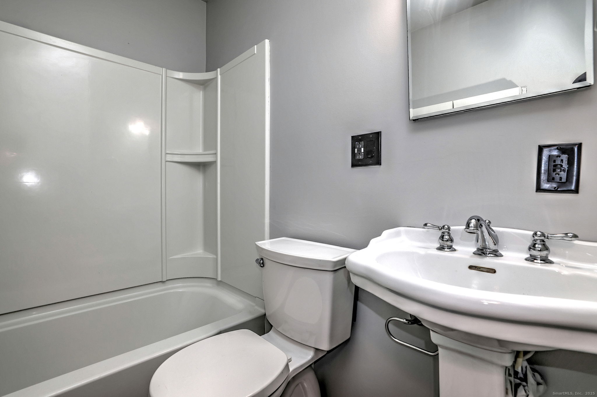 113 Chester Street Hamden, CT 06514 - Photo 27 of 40 a bathroom with a sink toilet and a bathtub