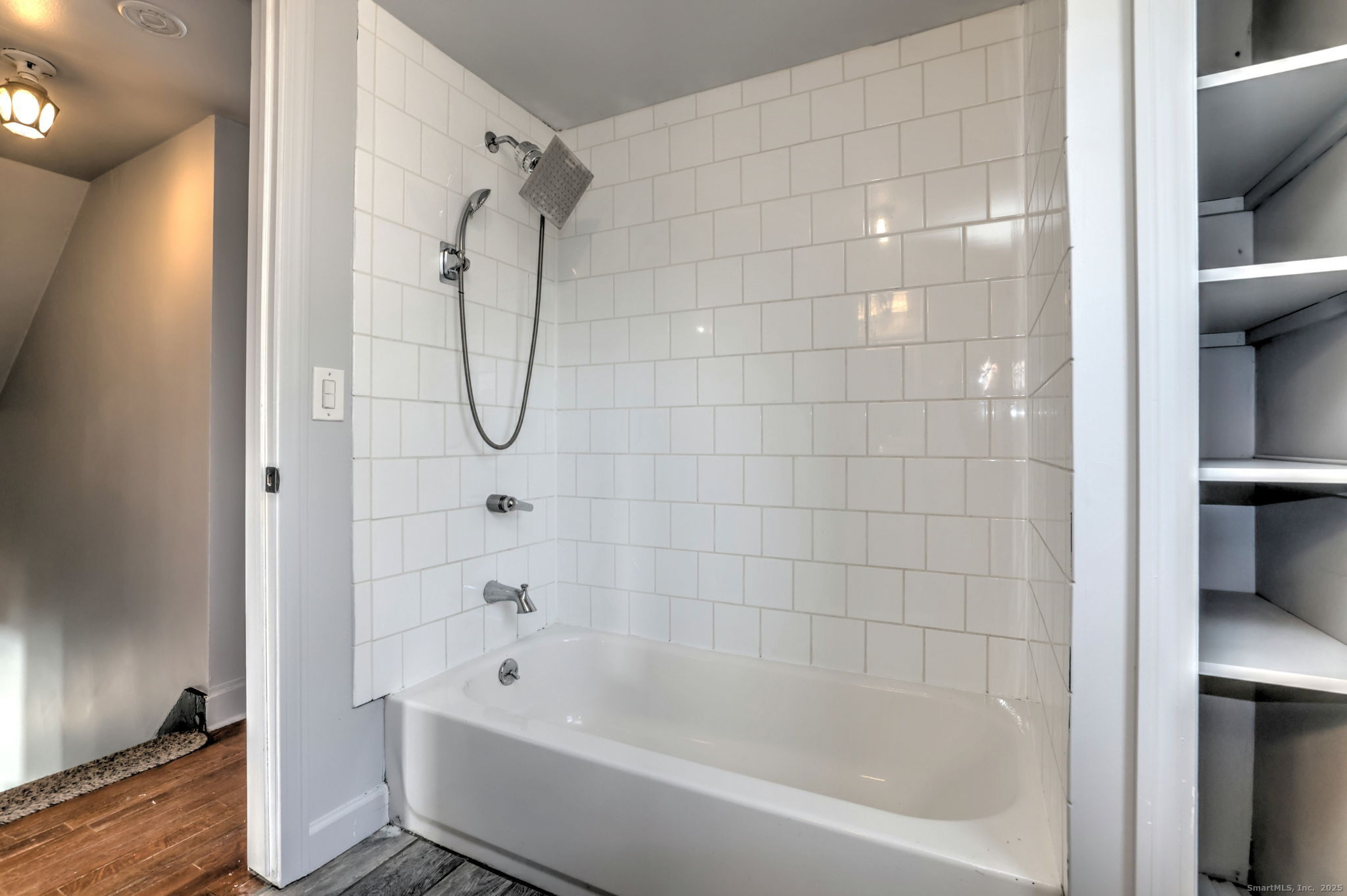 113 Chester Street Hamden, CT 06514 - Photo 33 of 40 a bathroom with a bathtub and shower