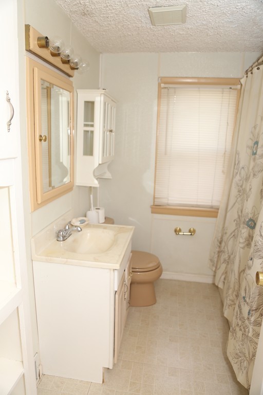 35 Long Terrace Springfield, MA 01104 - Photo 8 of 22 a bathroom with a sink toilet and shower