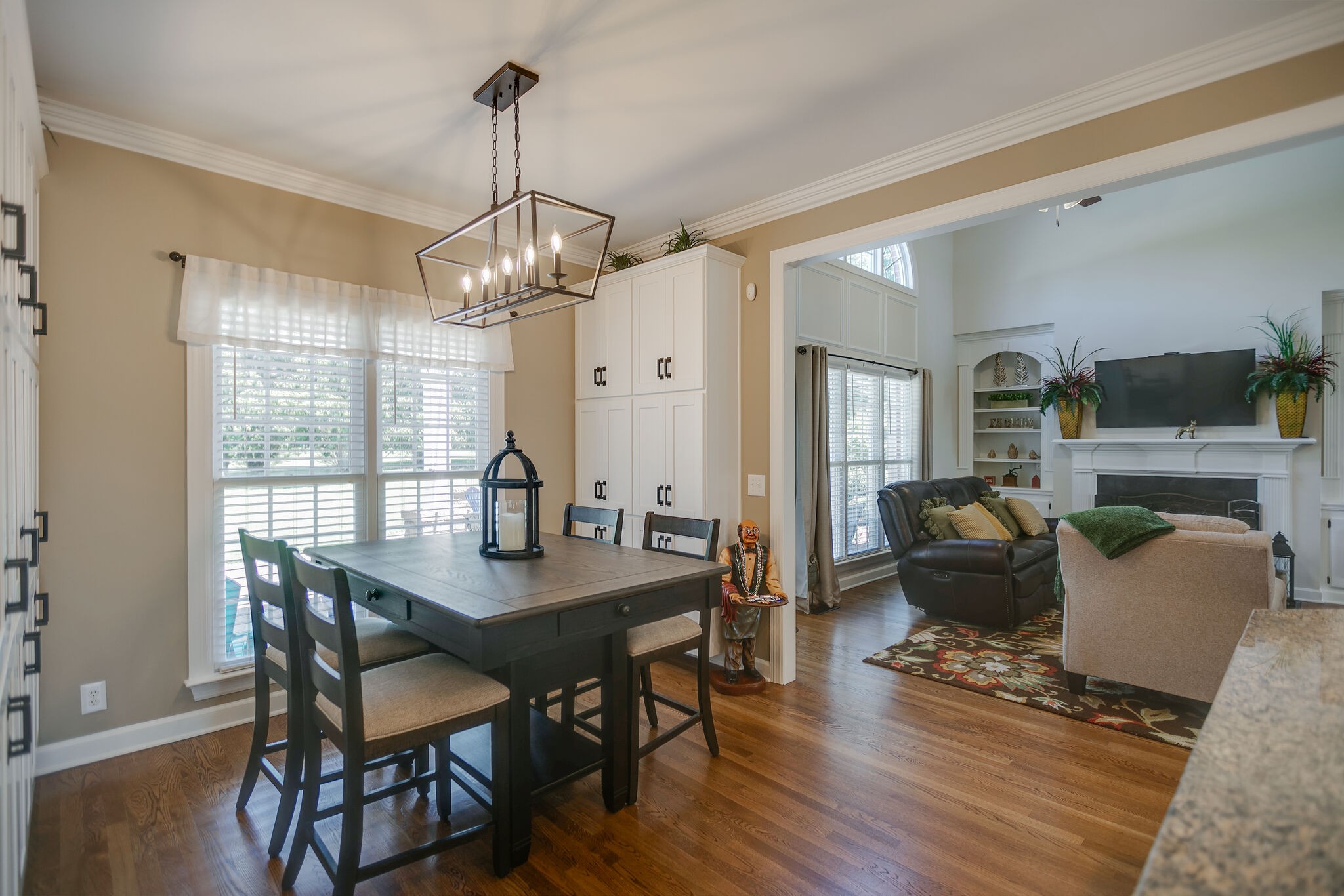 2260 Avery Court Franklin, TN 37067 - Photo 20 of 61 a view of a dining room with furniture window and wooden floor