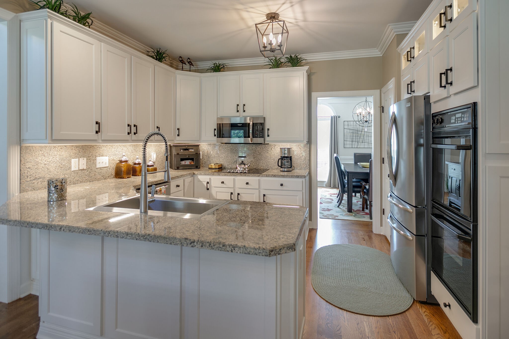 2260 Avery Court Franklin, TN 37067 - Photo 22 of 61 a kitchen with stainless steel appliances granite countertop a sink refrigerator and cabinets